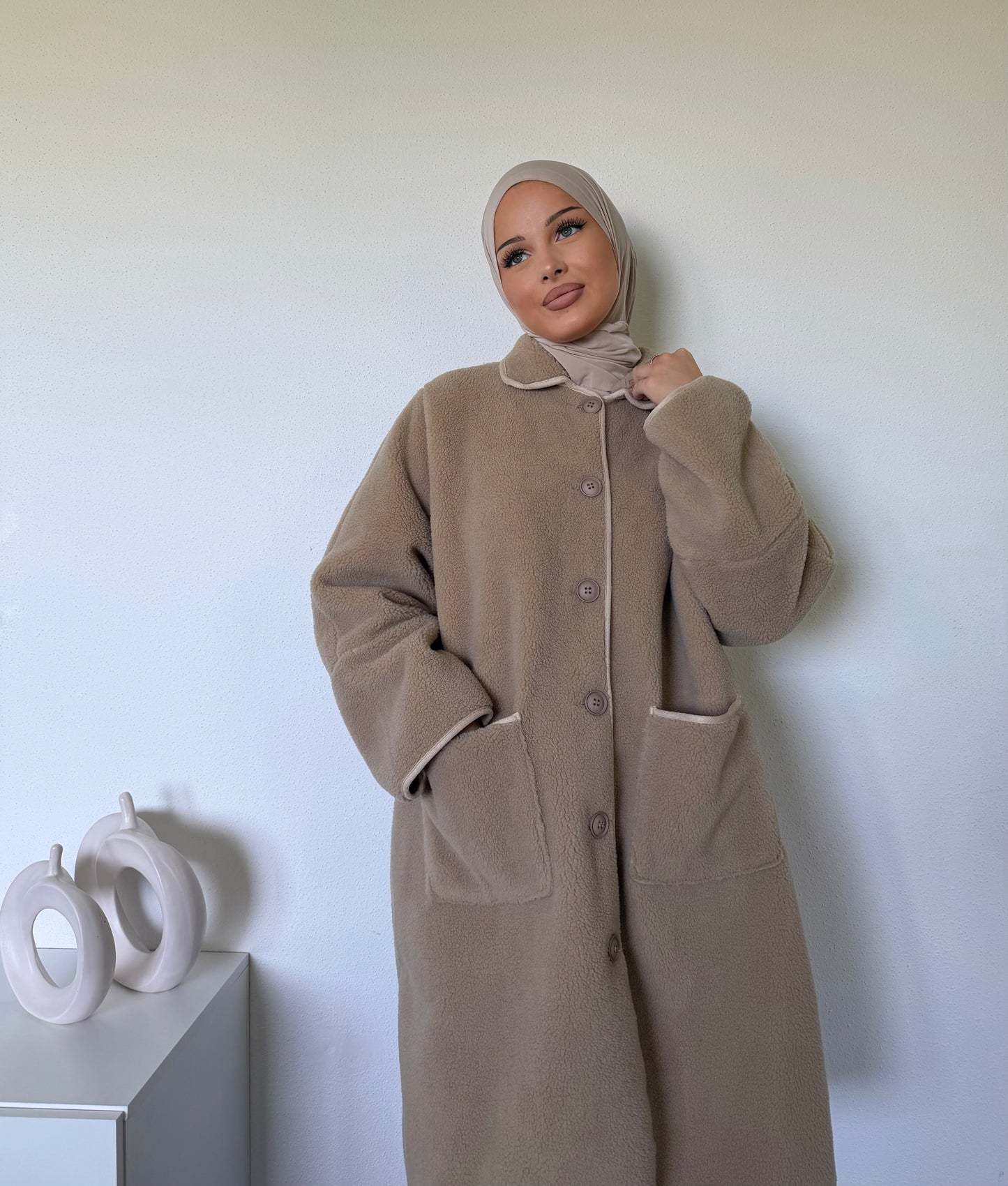 Manteau long effet mouton